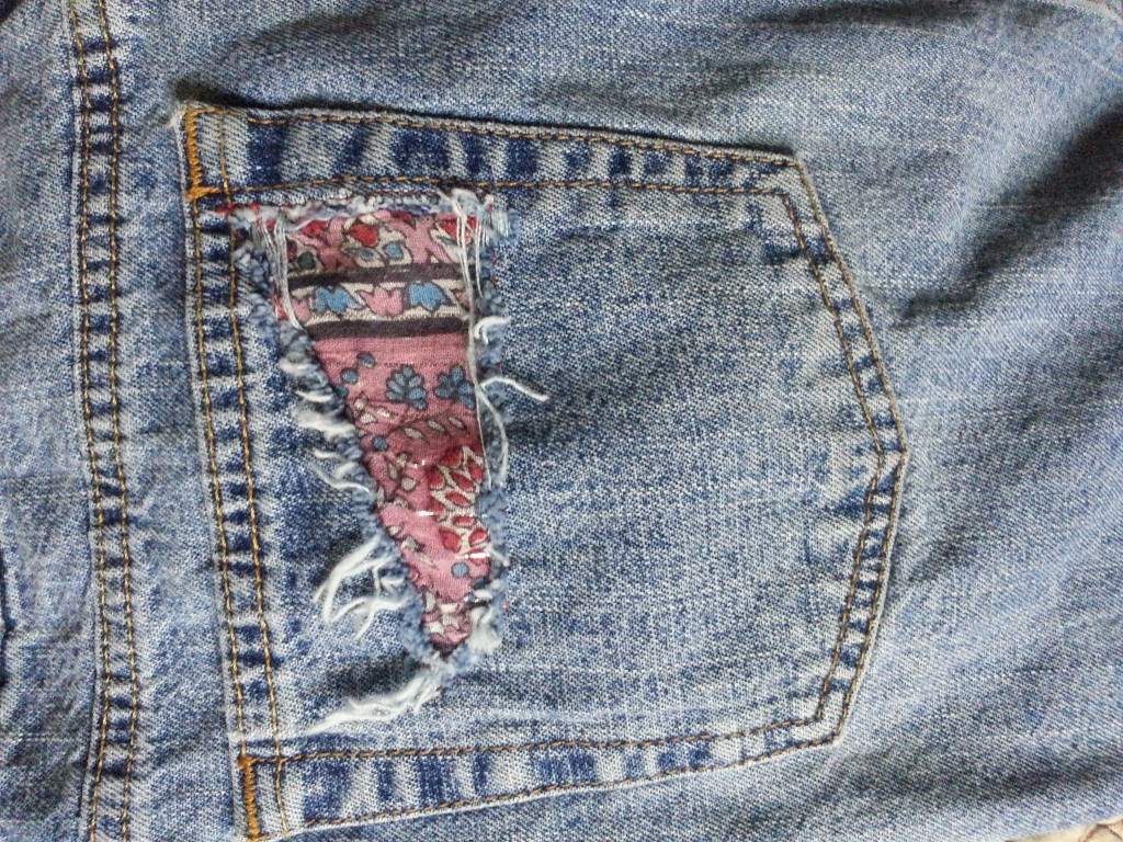 Upcycled denim skirt pocket patch Upcycled denim skirt pocket patch.