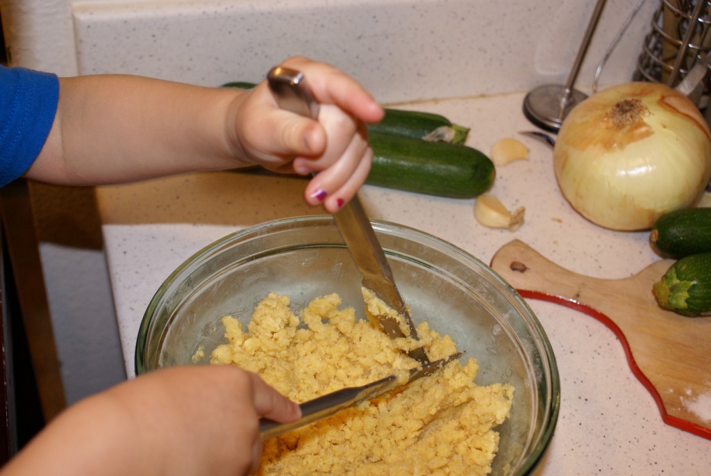 Arlo mixes crust Arlo demonstrates how to use a pair of knives to mix pie crust.