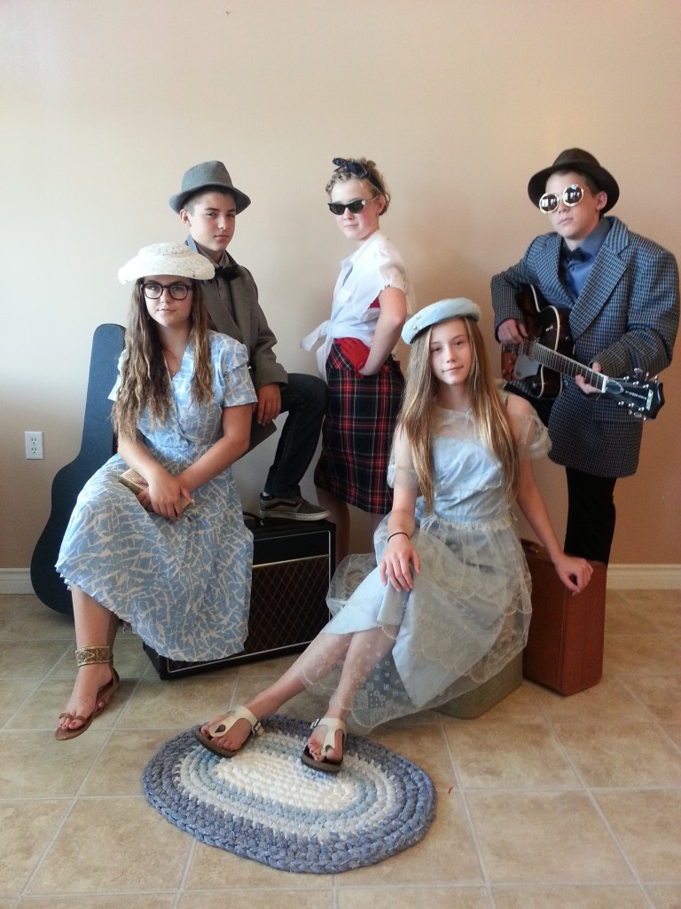 Cousins at the 60s photo booth at Grandma and Grandpa's tea party.