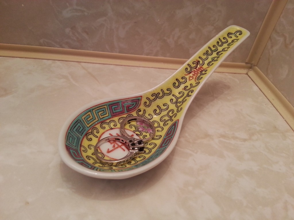 A colorful ceramic soup spoon holds my rings!
