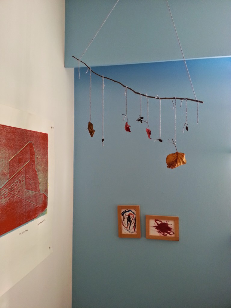 Arlo and I made this mobile with some nature things he collected. He also painted these watercolors. They are titled, from left to right, "Pool" and "Flower."