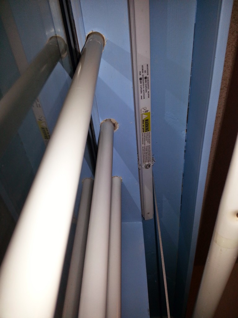 Top of the window frame with bars set back to allow for blinds to be installed in front.